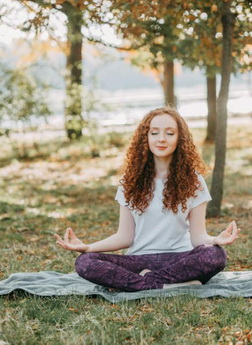 Lady using meditation therapy to ward off panic attacks