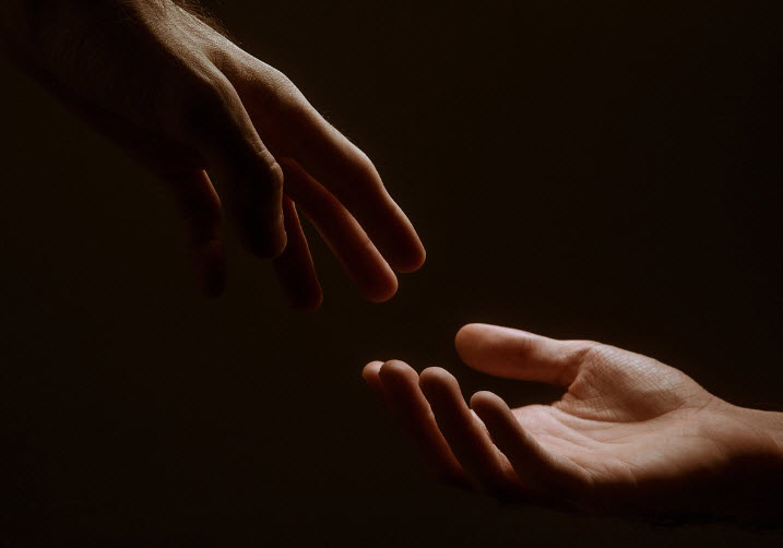 A helping hand offering  mental health therapy