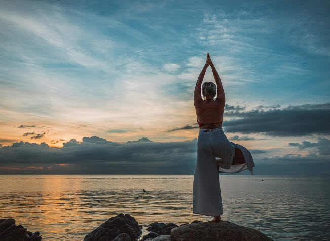 Woman practing mindful based theraeutic treatment