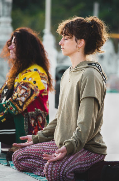 Lady practicing mindfulness based therapy technique 
