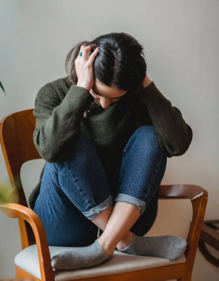 Confused lady suffering from guilt and in need of trigr therapy
